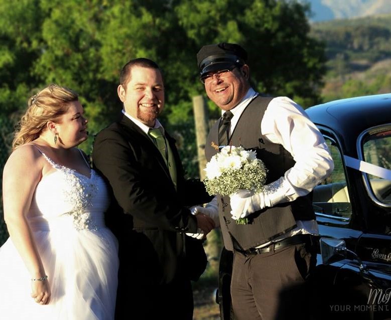 Friendly driver and happy customer shaking hands